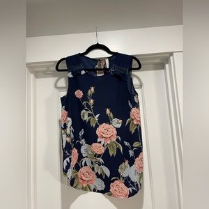 Blue sleeveless blouse